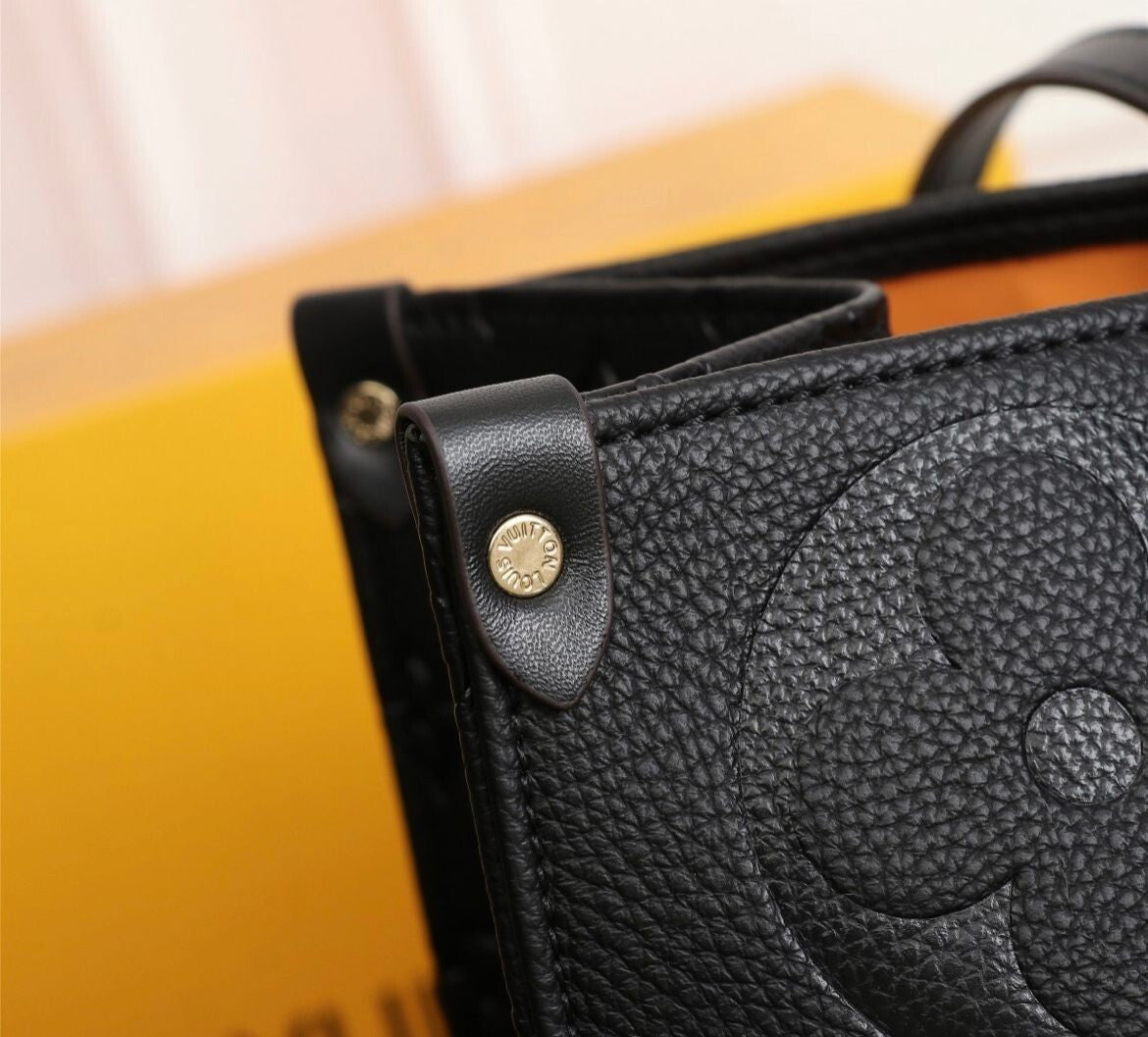 Louis Vuitton OnTheGo MM in Pelle Monogram Empreinte - Nero